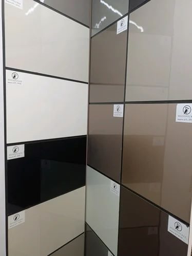 Display rack of high-gloss decorative acrylic sheets in neutral shades